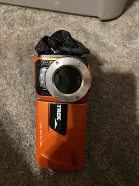 97084707m Coleman 16mp Trekhd Underwater Camcorder And Digital Camera Waterproof Full Hd Res Orange