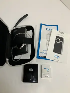 Flu2120b Flip Video Ultrahd 3rd Gen Action Cam With Book 2 Batteries And Storage Case Untested