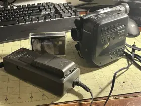 Nv-s1 Panasonic Svhsc Camcorder With Charger And Tape