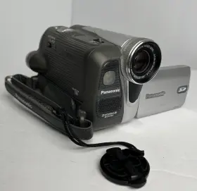 Pu-gs19 Panasonic With Hand Strap And Cap-cover But No Charger - Tested Working