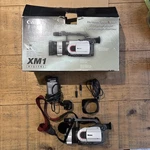 Canon XM1 Mini Dv Camcorder 3CCD 20X Zoom Boxed Untested. Fixed Price $134.57.