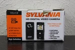 Sylvania 720P Digital Video Camera Purple Screen HD1Z-PB. Fixed Price $25.00.
