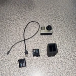 Gopro HERO4 Action Camera Silver Black With Batteries Charger Usb Cable. Fixed Price $50.00.
