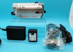 Canon FS100 Silver Camcorder Video Camera W/ Charger, Battery, Cords - For Parts. Fixed Price $54.97.