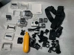 Gopro Hero CHDHX-301 Including Many Extra Accessories Tested W/ Batteries. Fixed Price $40.00.