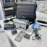 Hitachi DZ-GX3200A Camcorder W/10X Optical Zoom Charger Case Remote & Dvds. Fixed Price $88.38.