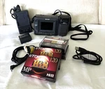 Sharp Camcorder VL-E600U, 16X Battery Charger Lens Cap Cords Strap Cassettes. Fixed Price $72.00.