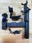 Dji Osmo Pocket OT110 4K Action Gimbal Camera W/ Extension Rod & Extra. Fixed Price $249.99.