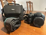 Sony Cyber-shot DSC-H300 Digital Camera Black, 20.1MP Strap Case. Fixed Price $75.00.