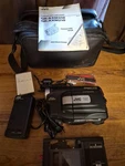 Jvc GR-AXM210 Vhs-c Camcorder W/ Charger, Battery, Manual, Bag, Cassette Adapter. Fixed Price $32.00.