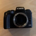 Canon Eos M5 Camera Bundle W/ 50MM F/1.8 Stm, 22MM Lens, Mount Adapter. Fixed Price $359.00.