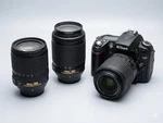Nikon D90 Dslr Camera Bundle W/ Battery & 3 Vr Lenses (18-105MM, Two 55-200MM). Fixed Price $249.00.