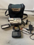 (sony Handy Cam Bundle) HDR-CX110 + CCD-TR818 Digital Converter. Fixed Price $350.00.