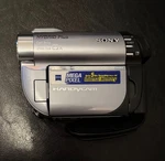 Sony DCR-DVD810 Silver 25X Zoom Hybrid Plus Handycam Camcorder W/battery. Fixed Price $100.00.