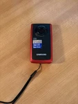 Samsung HMX-W190RN/XAA Camcorder/camera Blk/red 3M/10FT Waterproof 2M/6.5FT Shok. Fixed Price $28.00.