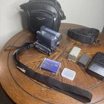 Panasonic PV-GS12 Minidv Camcorder 20X Zoom W/ Charger Batteries Case. Fixed Price $89.77.