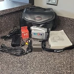 Canon ZR30 Minidv Camcorder With 2.5" Lcd, Bundle Tested Works. Fixed Price $115.00.
