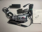 Cannon Optura Xi Mini Dvd CAMCORDER/2 Batteries-charger-manuel-strap. Fixed Price $110.00.