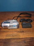 Panasonic Palmcorder PV-GS250 3CCD Leica Minidv/sd 10X Silver 2.5IN Charger. Fixed Price $89.99.