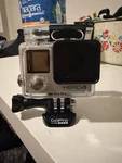 Gopro HERO4 Action Camera W/ Waterproof Housing, Lcd Bacpac, Mount & Battery. Fixed Price $44.99.