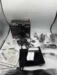 Sanyo Xacti DMX-HD1000 Camera Silver Turns On Remote Case Manuals Records. Fixed Price $178.99.