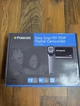 Polaroid DVG-720E Easy Grip Hd 720P Digital Camcorder Black With Spare Battery. Fixed Price $27.08.