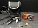 Polaroid T1031 10MP Digital Camera Orange Bundle With Case, 4 Gb Sd Card & Cable. Fixed Price $30.00.