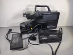 Sears Roebuck & Co. Vintage Solid State Vhs Movie Camera With Charger/ Battery. Fixed Price $49.99.