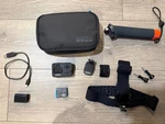 Gopro HERO9 Black Action Camera With Official Accessories. Fixed Price $150.00.