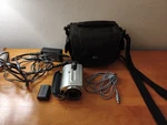 Sony DCR-SR42 Sd, Internal Hdd (silver) W/ Nightshot Mode & Base Charger. Fixed Price $110.00.