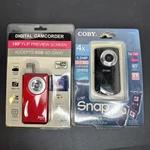 Jazz DV150 Digital Camcorder + Coby Snapp Lot New In Package. Fixed Price $41.99.