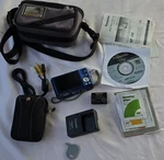 Panasonic Lumix DMC-ZS10 Blue 14.1MP 16X Gps Bundle Battery Charger Cases. Fixed Price $120.00.
