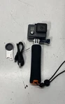 Gopro Hero HWBL1 Action Camera W/ Handle. Fixed Price $49.99.