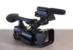 Video Camera, Sony HXR-NX100 Full Hd Nxcam Camcorder With Takstar Shotgun Mic. Fixed Price $1360.00.