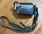 Jvc GZ-MG20U 20GB Hard Disk Camcorder W/ Battery Untested No Charger Parts Only. Fixed Price $18.99.