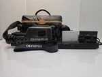Olympus VX-803-U, VF-BA82 8MM Movie Video Camera, Charger, Battery Adapter Case. Fixed Price $23.99.
