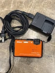 Nikon Coolpix AW110 Digital Camera Orange Waterproof Wifi Gps 16MP 5X Zoom. Fixed Price $139.00.