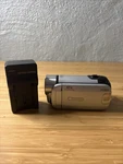 Canon FS300 Digital Video Camcorder With Charger - Parts Only. Fixed Price $35.00.