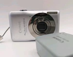 Canon Powershot SD1300 Is Digital Elph Camera 12.1MP 4X Op Zoom Silver Works. Fixed Price $199.00.