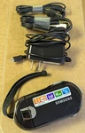 Samsung Camcorder (model #SMX-C14RN) W/charger, Av, & Computer Cords Working. Fixed Price $49.99.
