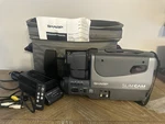 Vintage Sharp Slimcam Vhs Camcorder 12X Zoom Gray Handheld Bag Case Cables. Fixed Price $46.99.