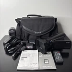 Sony Handycam FDR-AX100 4K Camcorder Fully Loaded Oem Bundle Near Mint. Fixed Price $999.00.