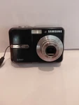 Samsung S860 8.1MP Digital Camera - Fully Functional. Fixed Price $29.99.