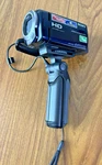 Sony HDR-CX260V Handycam W Charger Battery + GP-AVT1 Shooting Grip Mini Tripod. Fixed Price $169.15.