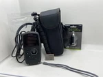 Kodak Playsport ZX5 Black Waterproof Video Camera + Tripod Case 32GB Bundle. Fixed Price $55.41.