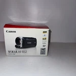 Canon Vixia HF-R32 Camcorder Video & Photo Camera W/ 32GB Internal Memory, Read*. Fixed Price $195.00.
