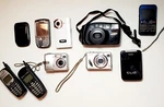 10 Piece Mixed Bundle Of Cell Phones And Cameras (for Parts/most Items Untested). Fixed Price $140.00.