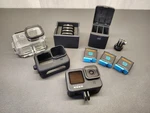 Gopro HERO9 Black Action Camera With Accessories - Missing Mic Drainage Cover. Fixed Price $179.99.