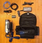 Sony DCR-TRV240 Camcorder Package W/nightshot Silver. Fixed Price $200.00.