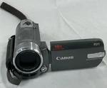 Canon FS11 Camcorder 48X Advanced Zoom 16 Gb Built-in Memory Flash Video Camera. Fixed Price $54.99.